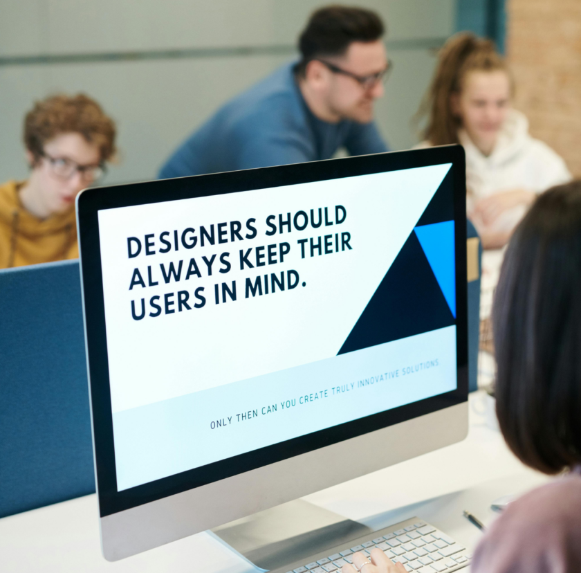 "Designers Should Always Keep their users in mind" - displayed on an Imac